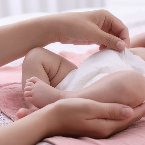 Nappy changing on a baby in a public washroom