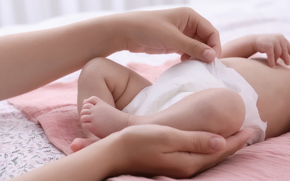 Nappy changing on a baby in a public washroom