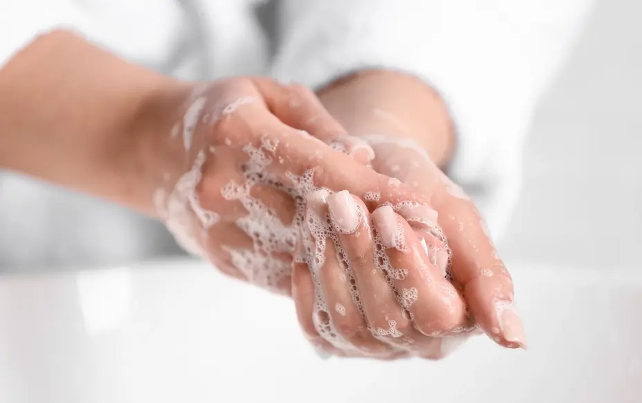 Washing hands with soap image