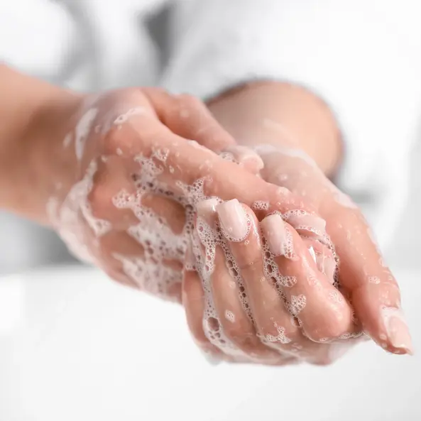 Washing hands with soap image