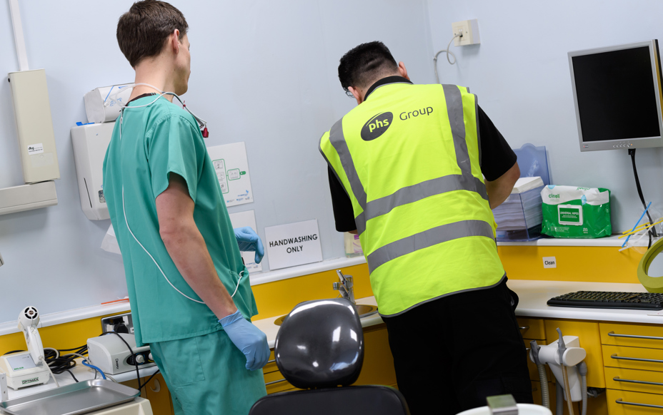 Collection of a sharps bin in a healthcare service
