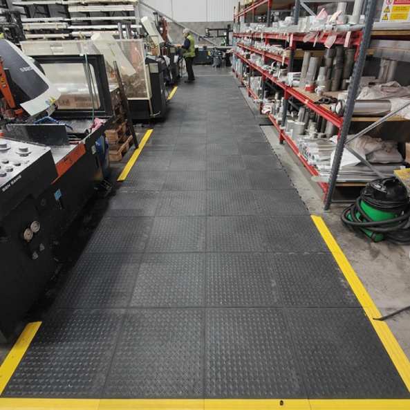 Wharehouse Worker Standing On Comfort Anti Fatigue Mat
