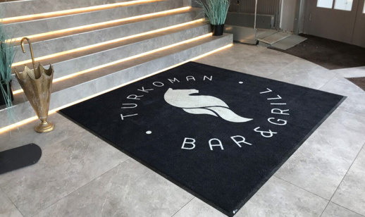 Turkoman Newmarket Logo Mat Loose Lay