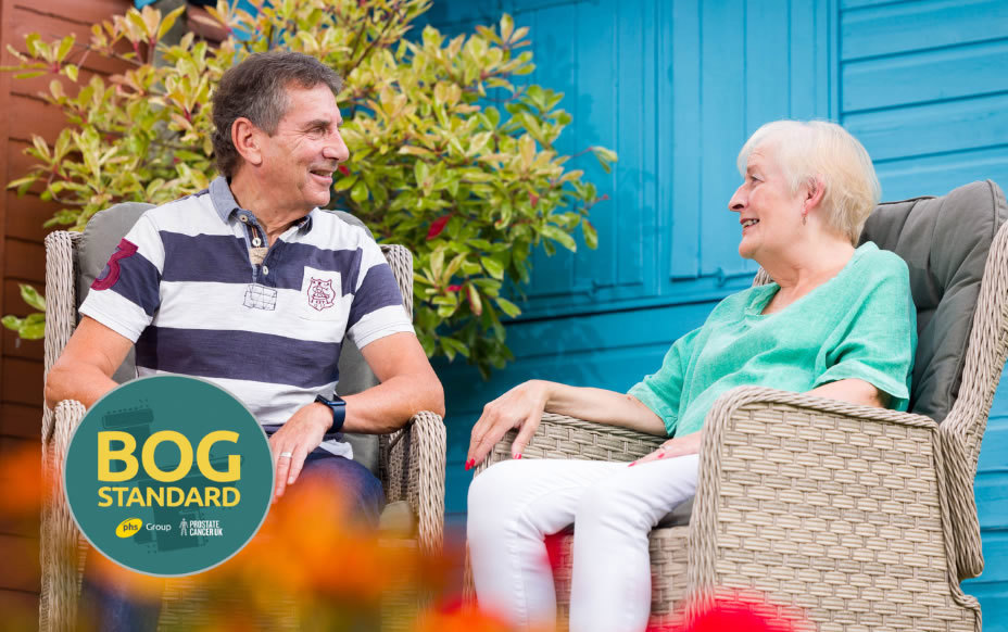 Elderly Couple Sitting Outside