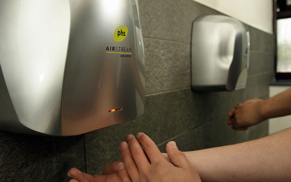 phs Airstream hand dryer being used in a washroom