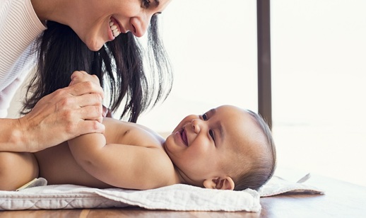 Mother and baby in baby changing room